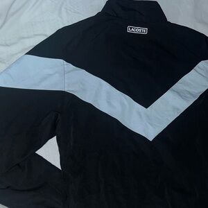 Lacoste Black and White Windbreaker with Chevron Design